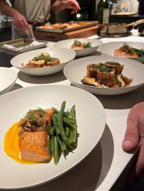 Plated salmon dinners ready for service
